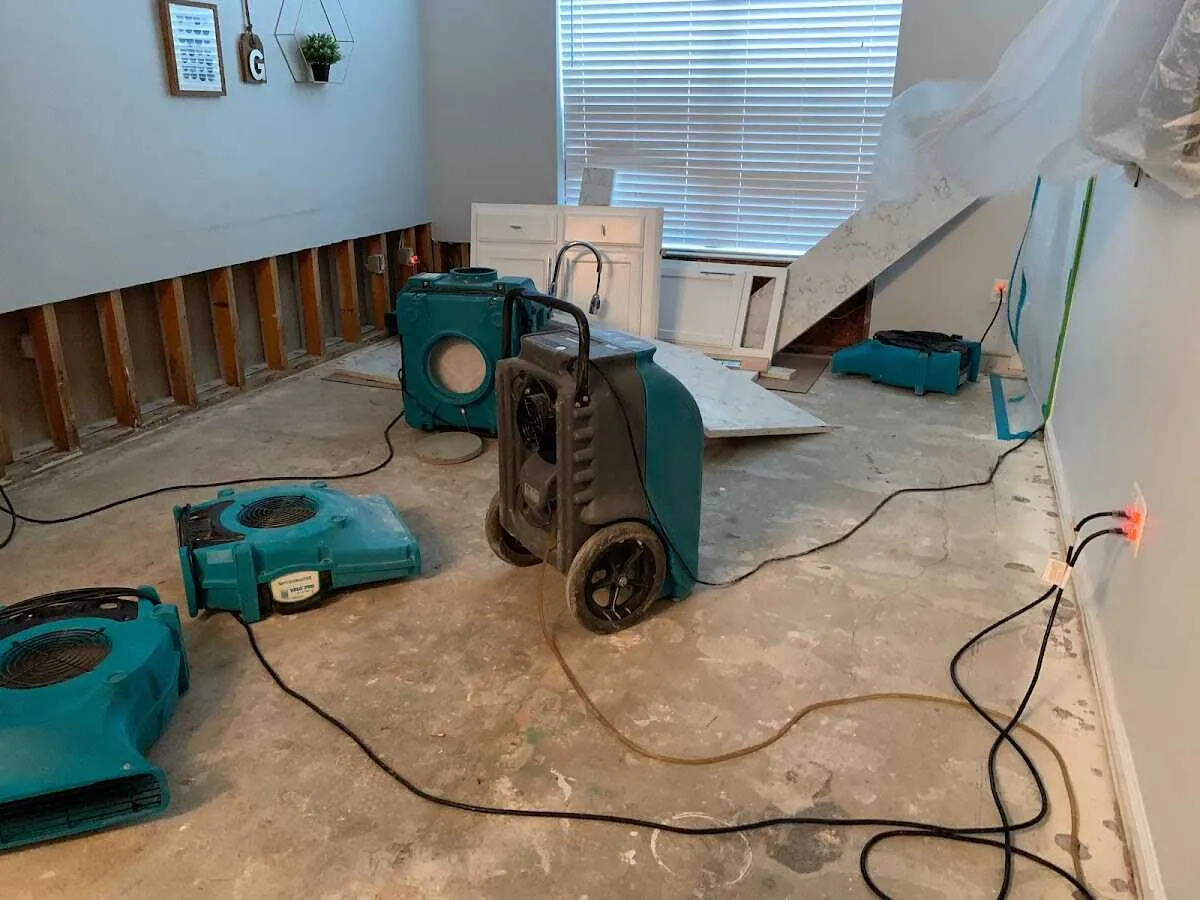 Dehumidifier in flood-cut room for Water Damage Restoration in Minneola
